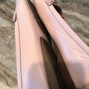 Pink leather Michael Kors shoes.